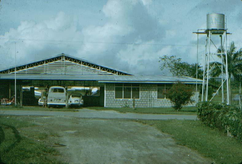 BD/37/15 - 
Front of the AMA building at Sentani
