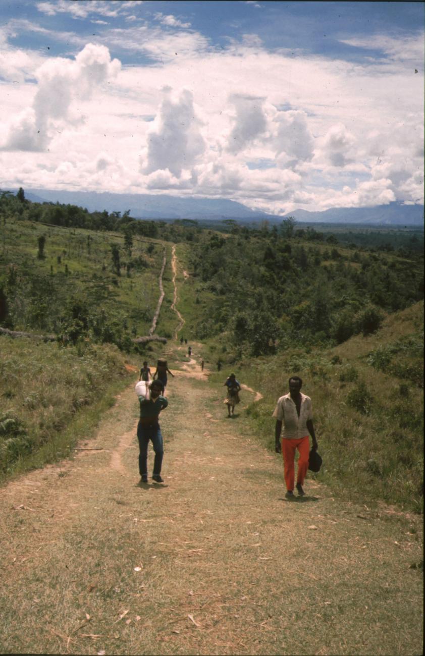 BD/166/148 - 
People walk on a trail
