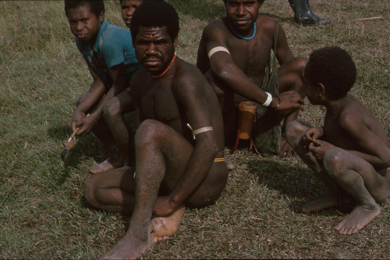 BD/166/345 - 
Some Papua people on the ground
