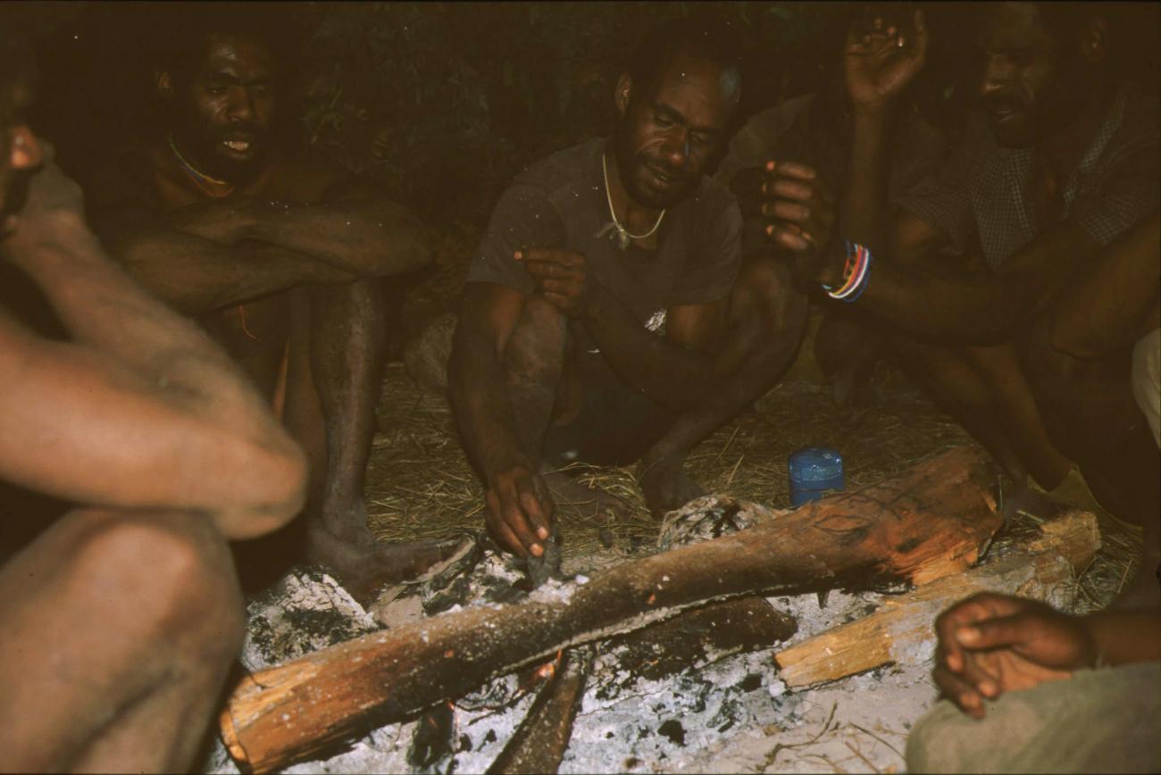 BD/166/97 - 
Men around wood fire
