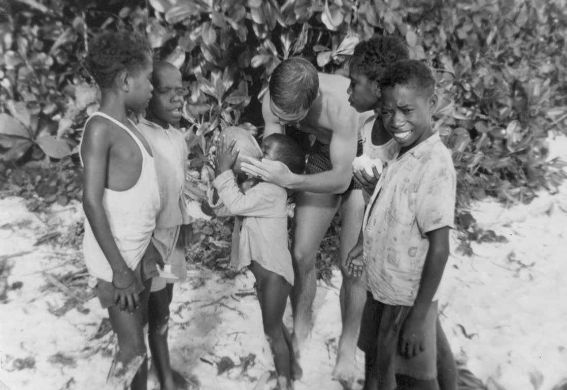 BD/277/52 - 
Papoea kinderen en blanke man
