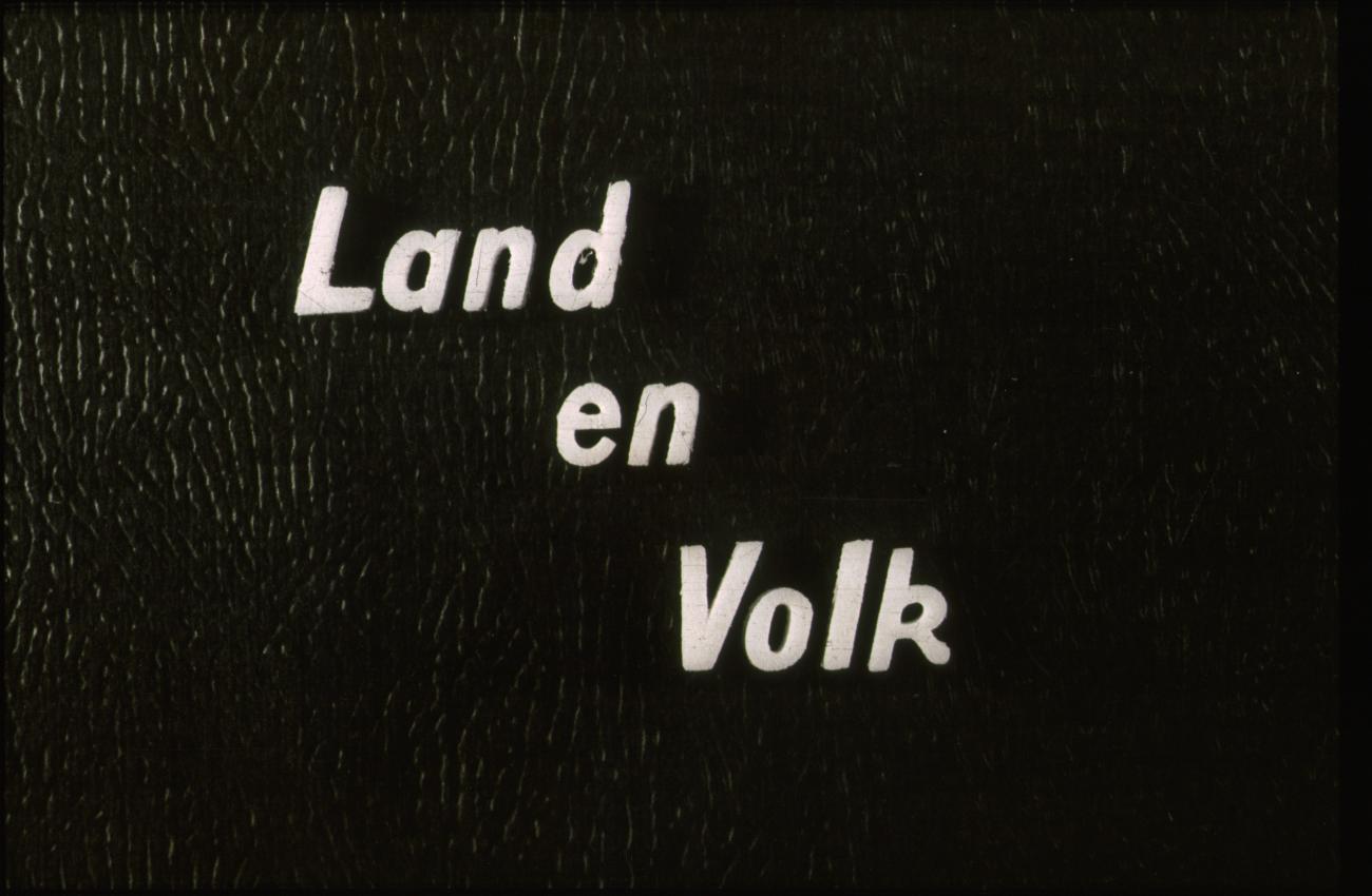 BD/186/36 - 
Tekst: Land en Volk
