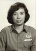 BD/309/101 Dorp Teminabuan, vrouw in uniform