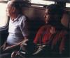 BD/309/77 Dorp Bogor, westerse jonge en wat oudere man in trein. Niet plaatsen, niet in Nieuw Guinea