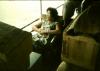 BD/144/238 Europees geklede vrouw op stoel op schip. Dubbel: zie 35