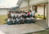 BD/269/500 Ingang S.P.G. gebouw met groep studenten