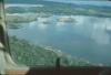 BD/171/292 Gevarieerd landschap (land/water) gezien vanuit vliegtuig
