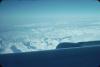 BD/171/64 Sneeuw op de toppen van de bergen vanuit een vliegtuig gezien