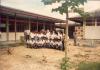 BD/269/502 Ingang S.P.G. gebouw met groep studenten
