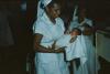 BD/171/878 Twee verpleegsters met babies in de armen